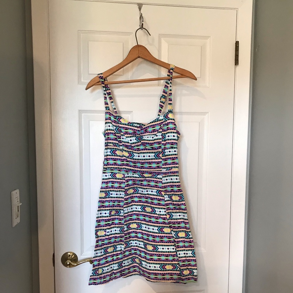 Divided pastel colored aztec print mini dress